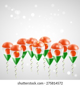 Flag of Niger on balloon. Celebration and gifts. Balloons on the feast of the national day. 