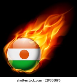 Flag of Niger as round glossy icon burning in flame