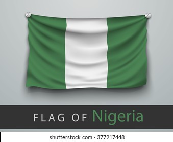 FLAG OF nigeria battered, hung on the wall, screwed screws