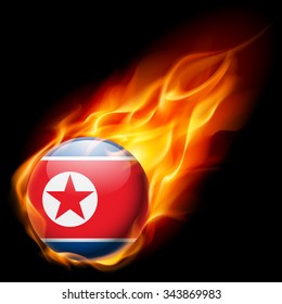 Flag of North Korea as round glossy icon burning in flame