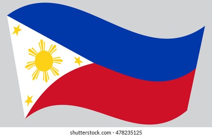 Flag of the Philippines waving on gray background. Philippine national flag.