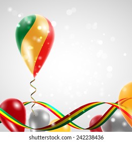 Flag of the Republic of Congo on balloon. Celebration and gifts. Ribbon in the colors are twisted. Balloons on the feast of the national day. 