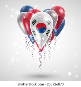 Flag of the Republic of Korea on air balls in heart-shaped. Celebration and gifts. Ribbon in the colors are twisted under the balloon. Independence Day. Balloons on feast of national