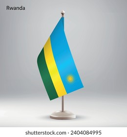 Flag of Rwanda hanging on a flag stand. Usable for summit or conference presentaiton