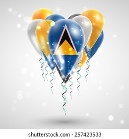 Flag of Saint Lucia on air balls in heart-shaped. Celebration and gifts. Ribbon in the colors are twisted under the balloon. Independence Day. Balloons on feast of the national