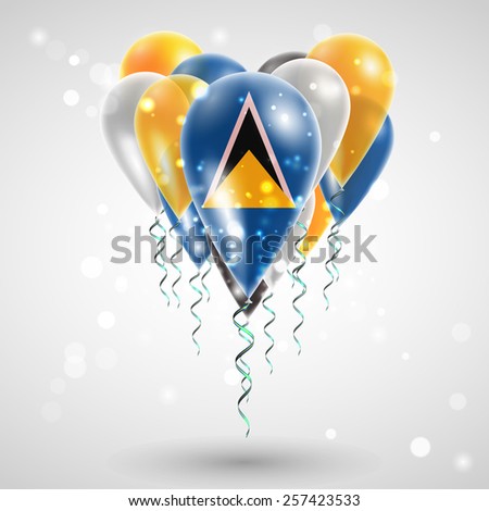 Flag of Saint Lucia on air balls in heart-shaped. Celebration and gifts. Ribbon in the colors are twisted under the balloon. Independence Day. Balloons on feast of the national