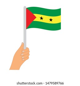 Flag of Sao Tome and Principe. Hand holding a Sao Tome and Principe flag - vector icon.
