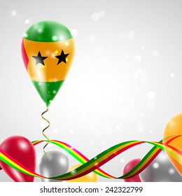 Flag of Sao Tome and Principe on balloon. Celebration and gifts. Ribbon in the colors are twisted. Balloons on the feast of the national day. 