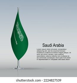 Flag of Saudi Arabia hanging on a flagpole stands on the table. Vector illustration