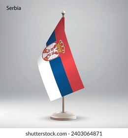Flag of Serbia hanging on a flag stand. Usable for summit or conference presentaiton