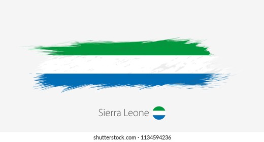 Flag of Sierra Leone, grunge abstract brush stroke on gray background. Vector illustration.