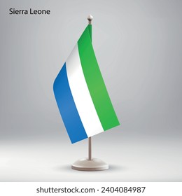 Flag of Sierra Leone hanging on a flag stand. Usable for summit or conference presentaiton