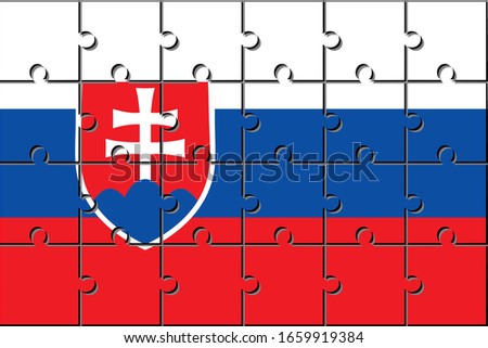 flag of slovakia made with jigsaw puzzle pieces.