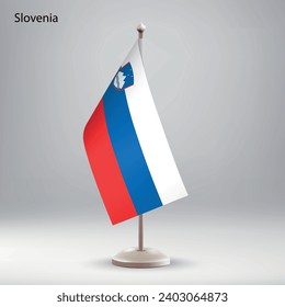 Flag of Slovenia hanging on a flag stand. Usable for summit or conference presentaiton