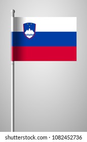 Flag of Slovenia. National Flag on Flagpole. Isolated Illustration on Gray Background
