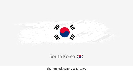 Flag of South Korea, grunge abstract brush stroke on gray background. Vector illustration.