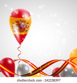Flag of Spain on balloon. Celebration and gifts. Ribbon in the colors are twisted. Balloons on the feast of the national day. 