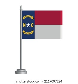 Flag of State of North Carolina (USA) flying on a flagpole stands on the table. Vector illustration