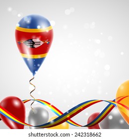 Flag of Swaziland on balloon. Celebration and gifts. Ribbon in the colors are twisted. Balloons on the feast of the national day. 