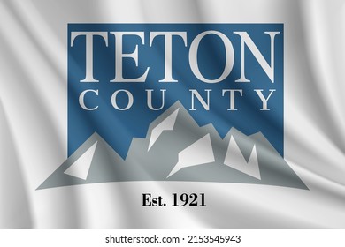 Flag of Teton County, Wyoming, USA. Realistic waving flag of Teton County vector background.