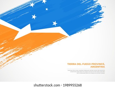 Flag of Tierra del Fuego Province, Argentina with creative painted brush stroke texture background