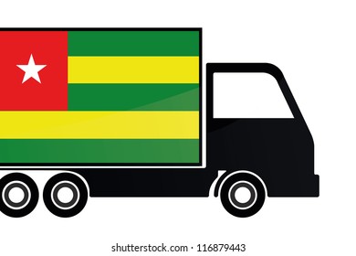The flag of Togo painted on the side of the silhouette of a truck