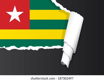 Flag of Togo under ripped paper vector illustration.