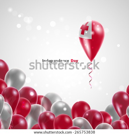 Flag of Tonga on balloon. Celebration and gifts. Ribbon in the colors are twisted Independence Day. Balloons on the feast of the national