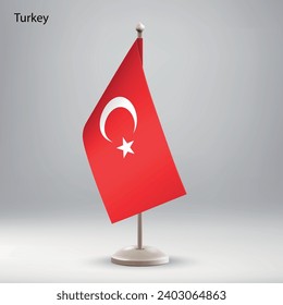 Flag of Turkey hanging on a flag stand. Usable for summit or conference presentaiton