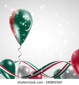 Flag of Turkmenistan on balloon. Celebration and gifts. Ribbon in the colors are twisted. Balloons on the feast of the national day. 