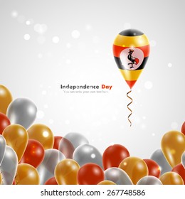 Flag of Uganda on balloon. Celebration and gifts. Balloons on the feast of the national day.
