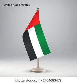 Flag of United Arab Emirates hanging on a flag stand. Usable for summit or conference presentaiton