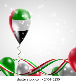 Flag of United Arab Emirates on balloon. Celebration and gifts. Ribbon in the colors are twisted. Balloons on the feast of the national day. 