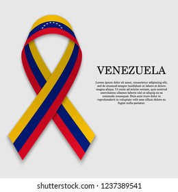 Flag of Venezuela on stripe ribbon isolated on white background. Template for independence day