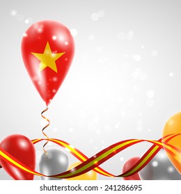 Flag of Vietnam on balloon. Celebration and gifts. Ribbon in the colors are twisted. Balloons on the feast of the national day. 