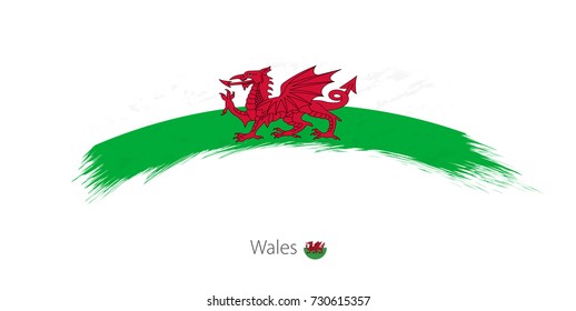 Flag of Wales in rounded grunge brush stroke. Vector illustration.