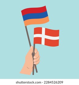 Flags of Armenia and Denmark, Hand Holding flags