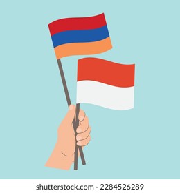 Flaggen Armeniens und Monaco, handgeführte Flaggen