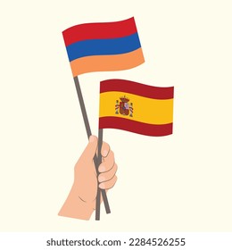 Flags of Armenia and Spain, Hand Holding flags