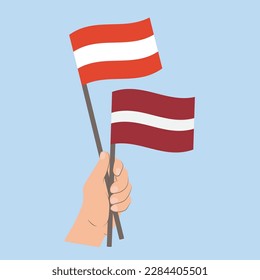 Flags of Austria and Latvia, Hand Holding flags