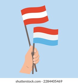Flags of Austria and Luxembourg, Hand Holding flags