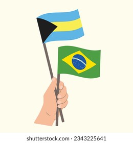 Flags of Bahamas and Brazil, Hand Holding flags