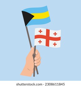 Flags of Bahamas and Georgia, Hand Holding flags