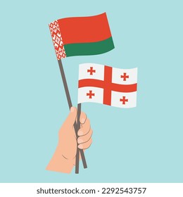 Flags of Belarus and Georgia, Hand Holding flags