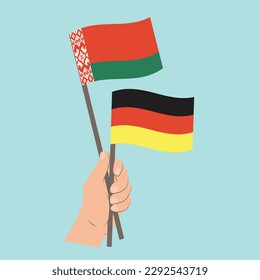 Flags of Belarus and Germany, Hand Holding flags
