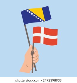 Flags Bosnia and Herzegovina and Denmark, Hand Holding flags