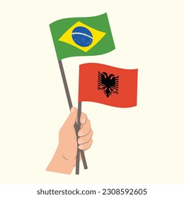 Flags of Brazil and Albania, Hand Holding flags