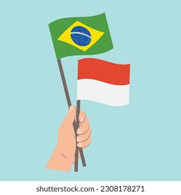 Flags of Brazil and Monaco, Hand Holding flags