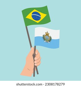 Flags of Brazil and San Marino, Hand Holding flags