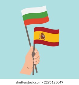 Flags of Bulgaria and Spain, Hand Holding flags